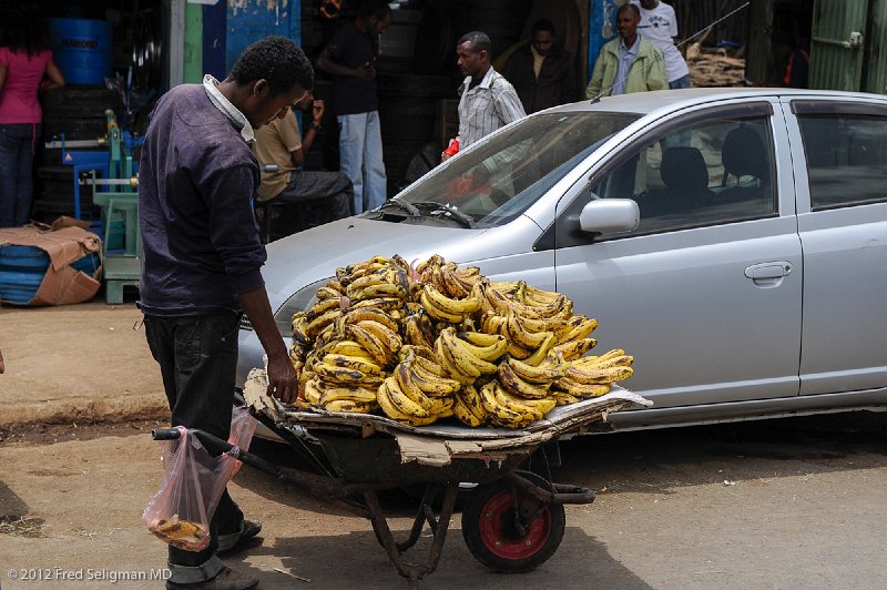 20120328_115206 Nikon D3S 2x3.jpg - One of many banana vendors